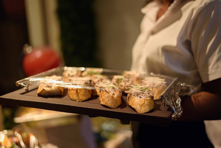 Waiter holding an elegant appetizer tray