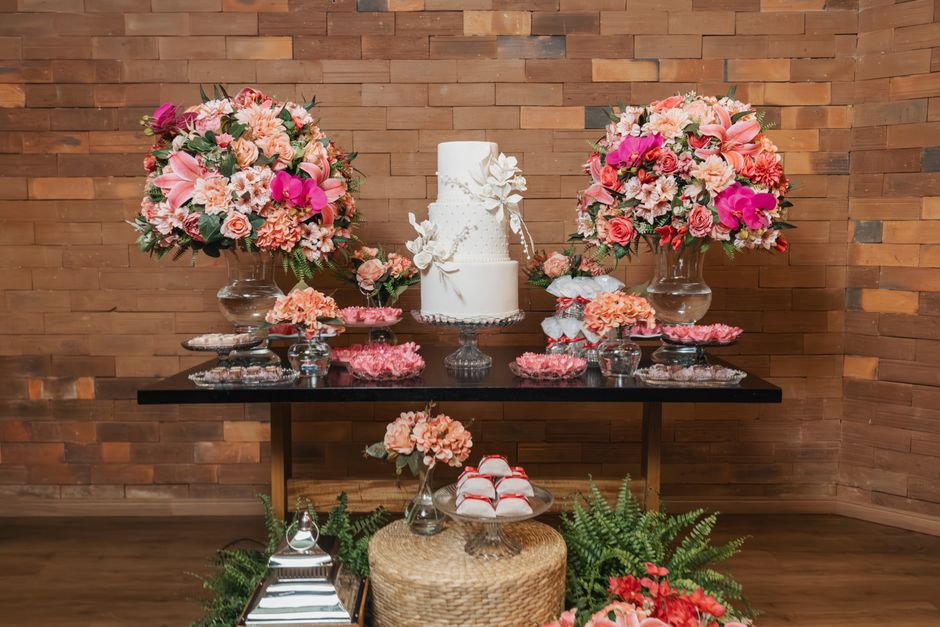 Beautifully arranged wedding cake dessert table